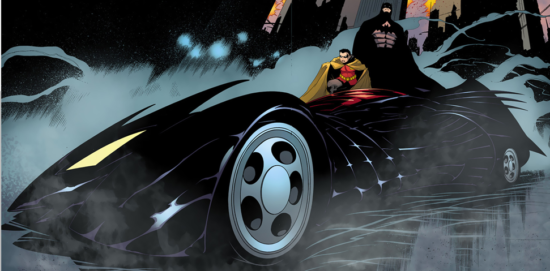 Batman et Robin prennent la pose à côté de la Batmobile