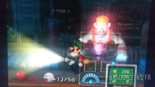 Luigi's Mansion Luigi devant un fantôme culturiste