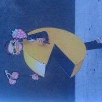 Pixelmania enfant portant un costume de Pac-Man